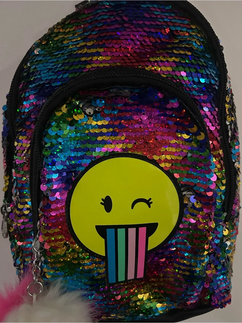 Justice Rainbow Sequin Backpack with Yellow Emoji and Pink Pom